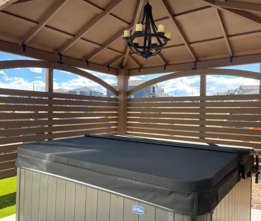Covered deck & hot tub