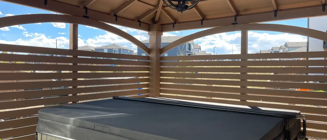 Covered deck & hot tub