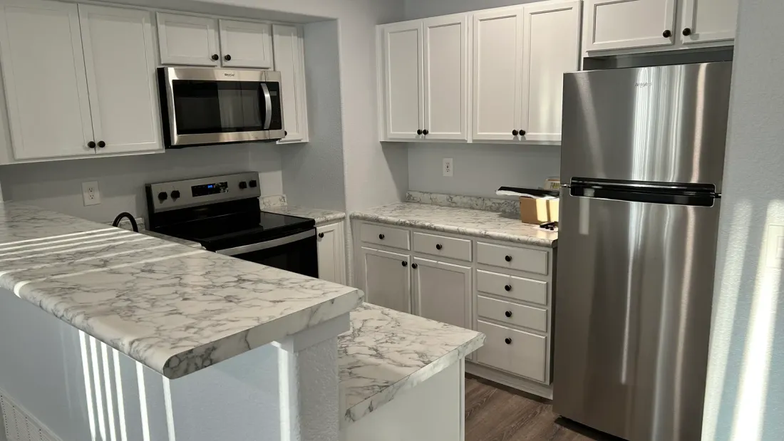 After: Dated kitchen → bright & modern